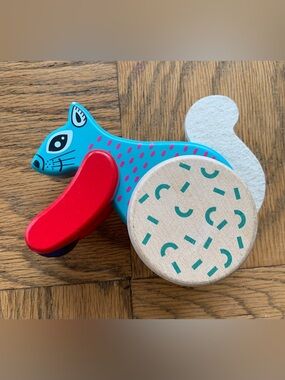 Bajo Wood Blue Jumping Squirrel On Wheels Push Toy
